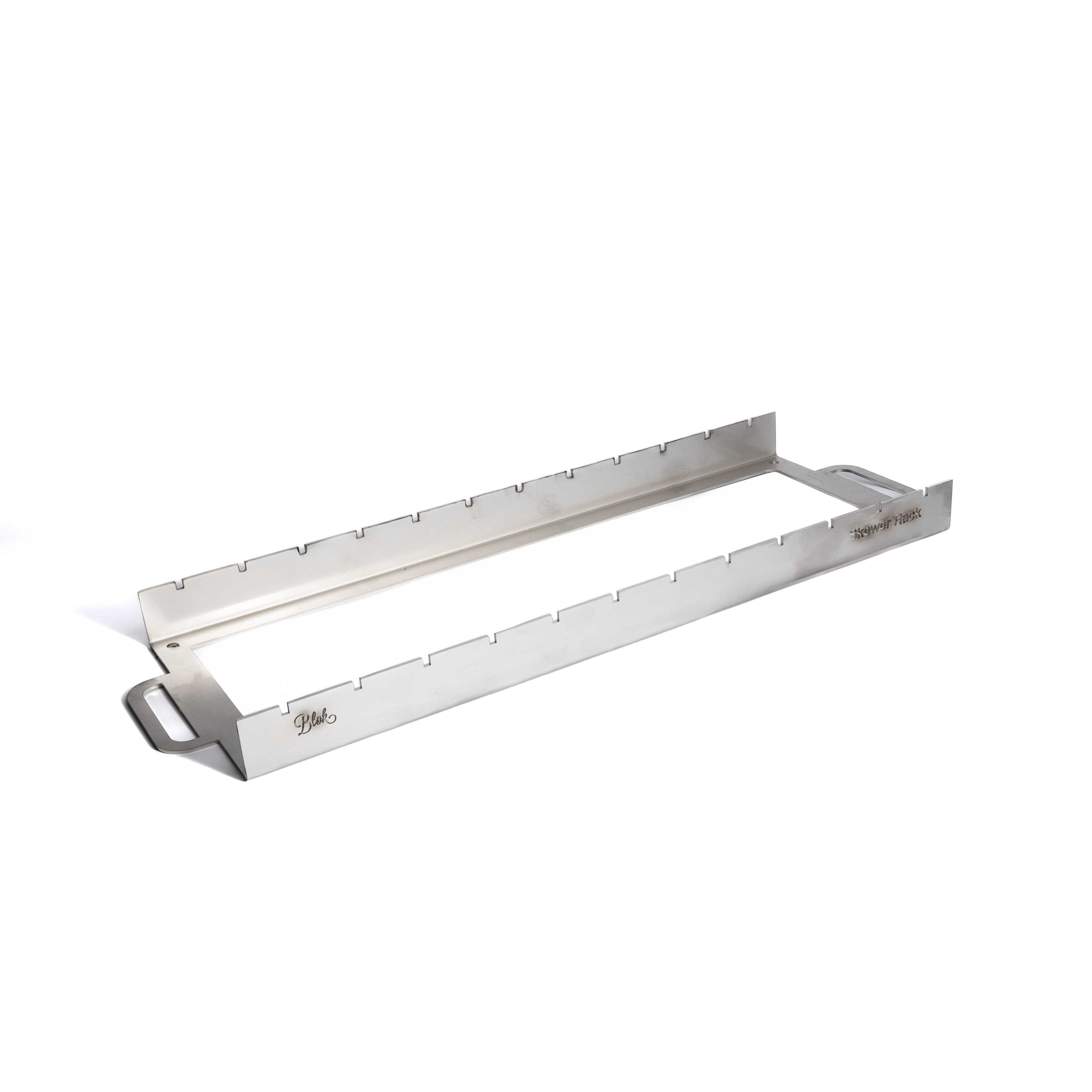 Stainless steel grill rack on a white background