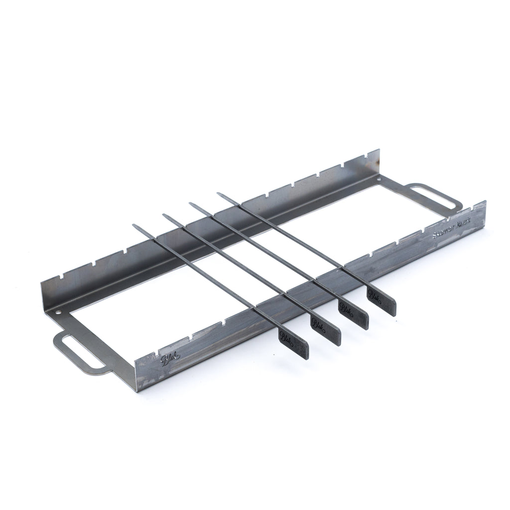 Metal skewer rack showing skewers