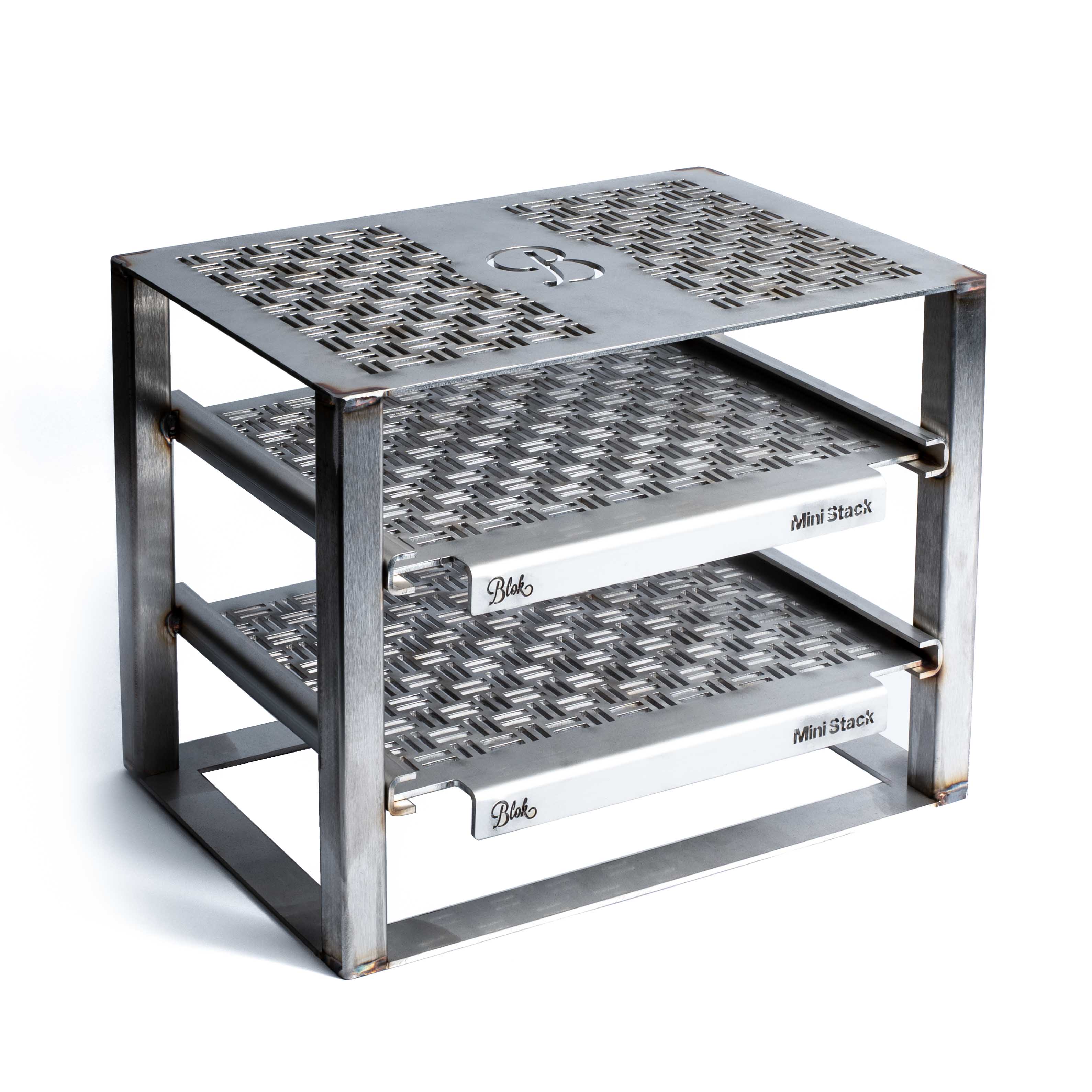 metal grill stand with engraved patterns on a white background